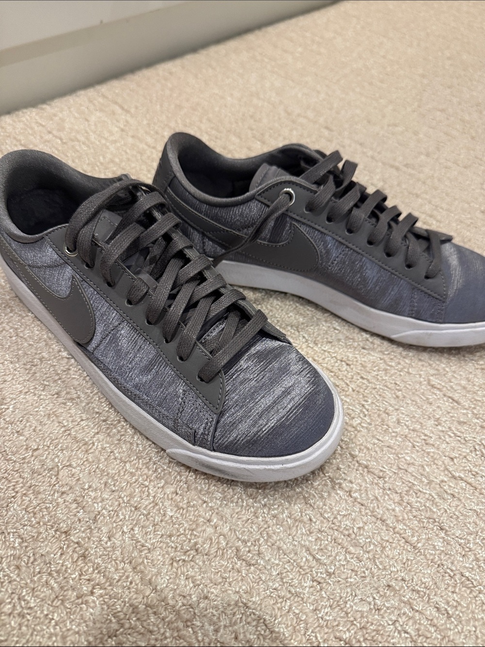 Nike silver satin-like sneakers